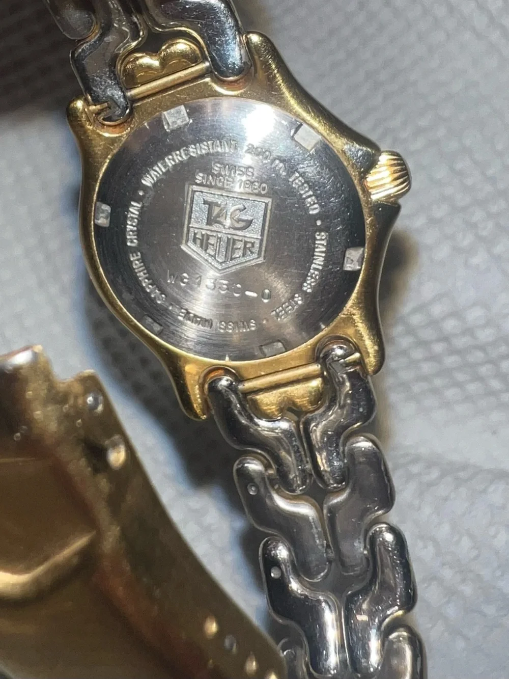 Tag Heuer Gold Tone Watch with Cream Dial and Black Bezel Accents 28mm